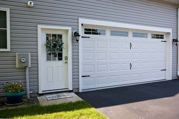 24/7 Emergency Garage Door Panel Replacement experts in Questa, NM